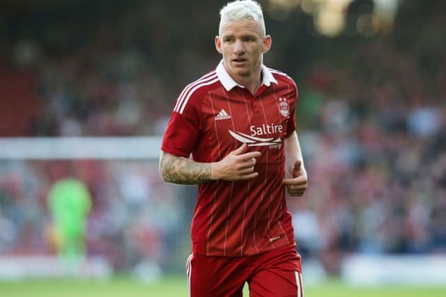 Aberdeen's Jonny Hayes has been ruled out of tonight's Europa League tie at Maribor after injuring a hamstring in training. Picture: SNS