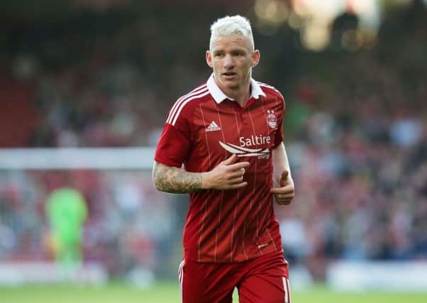 Aberdeen's Jonny Hayes has been ruled out of tonight's Europa League tie at Maribor after injuring a hamstring in training. Picture: SNS