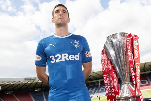 Lee Wallace with the new Rangers kit at Hampden on Monday. Picture: SNS
