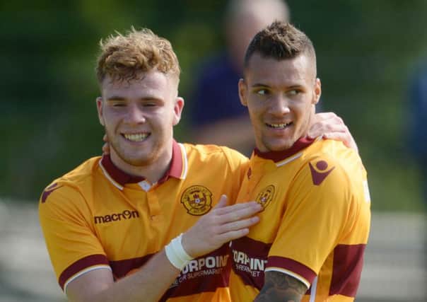 Johnson, right, is wanted by the League One club. Picture: SNS