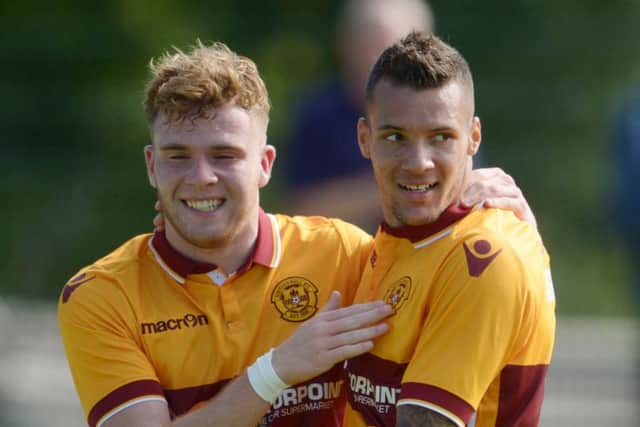 Johnson, right, is wanted by the League One club. Picture: SNS
