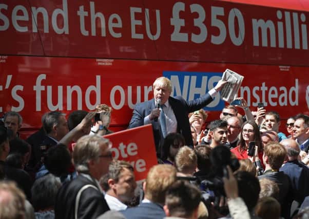 Boris Johnson addresses a Leave rally with the Â£350m NHS spending figure prominent. Picture: Getty Images