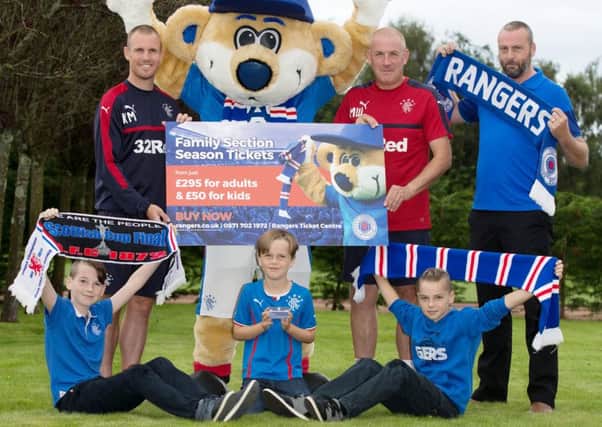 Kenny Miller, left, and manager Mark Warburton lend a hand promoting family season tickets. Picture: SNS