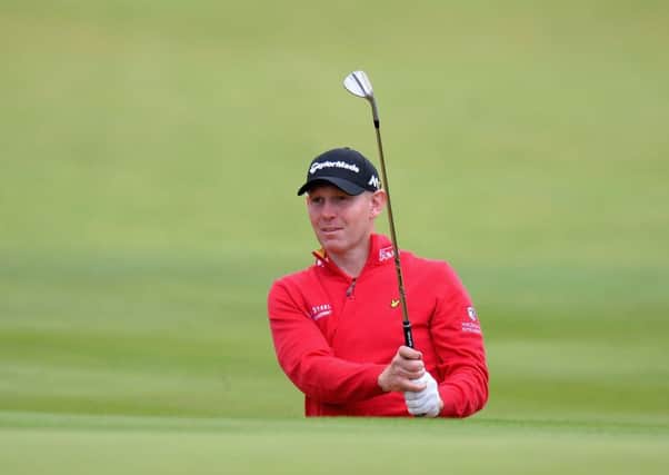 Stephen Gallacher plays out of a bunker onto the 18th green during the Aberdeen Asset Management Paul Lawrie Matchplay Pro-Am. Picture: Getty