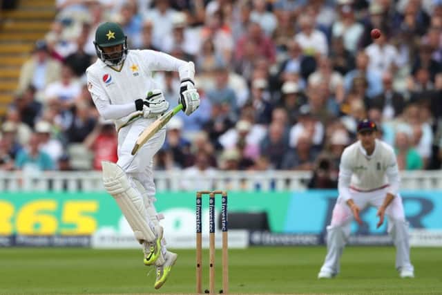 Pakistan batsman Azhar Ali turns the ball off his hip and sets off for a run to complete his hundred. Picture: Nick Potts/PA Wire