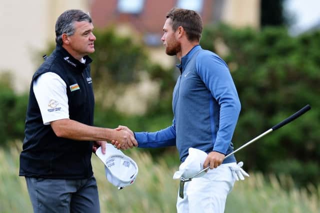 Scotland's Paul Lawrie is congratulated by Lucas Bjerregaard of Denmark after winning their match on day one of the Aberdeen Asset Management Paul Lawrie Matchplay at Archerfield Links. Picture: Tony Marshall/Getty