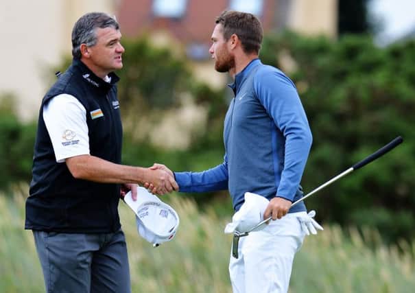 Scotland's Paul Lawrie is congratulated by Lucas Bjerregaard of Denmark after winning their match on day one of the Aberdeen Asset Management Paul Lawrie Matchplay at Archerfield Links. Picture: Tony Marshall/Getty