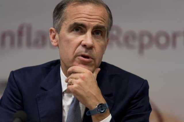 The governor of the Bank of England unveiled new record-low interest rates on Thursday in bid to halt economic slowdown. Picture: PA