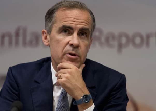 The governor of the Bank of England unveiled new record-low interest rates on Thursday in bid to halt economic slowdown. Picture: PA