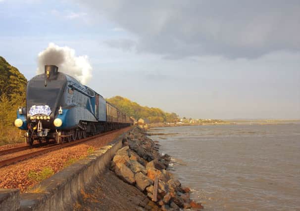 A steam train on the Forthside rail line near the village of Culross in Fife. Photograph: Mark Walker