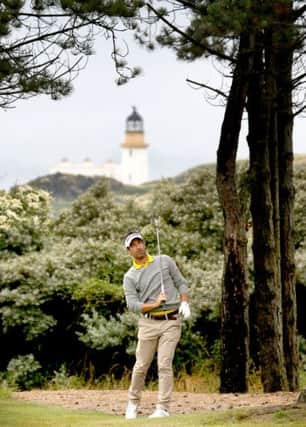 Fidra Island provides a spectacular backdrop as Eduorda De La Riva plays his second shot to the fifth at Archerfield Links. Picture: PA