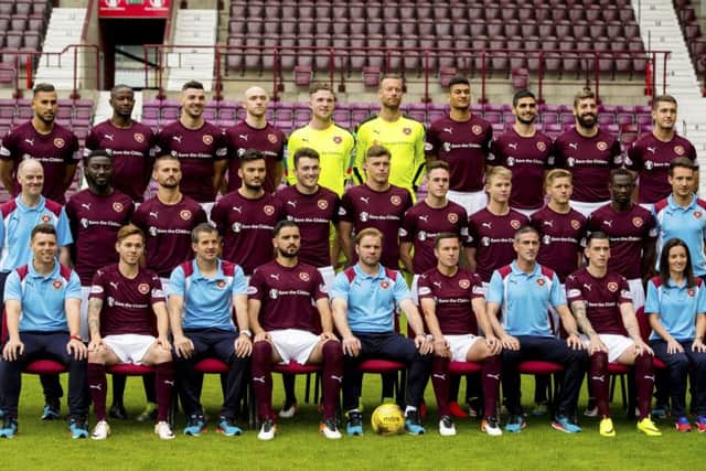 Hearts' players and staff pose for their team photo ahead of the new season. Picture: SNS
