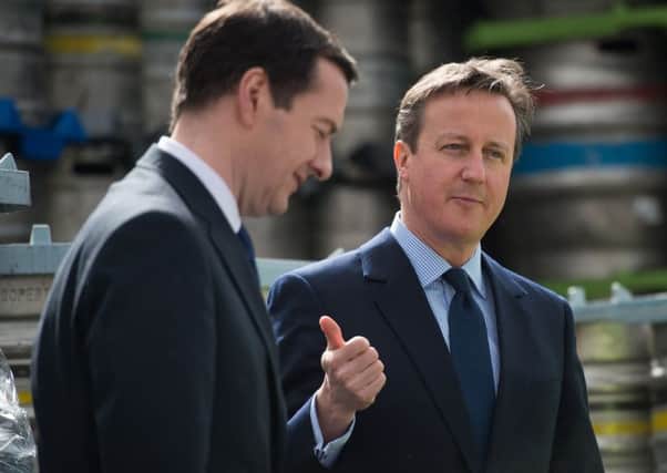 Cameron with former chancellor George Osborne, who he has made a Companion of Honour. Photograph: Leon Neal/Getty