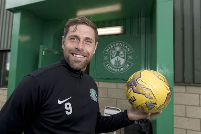 Hibs striker Grant Holt believes the confidence gained from last seasons Scottish Cup triumph will fuel the drive towards promotion. Picture: SNS
