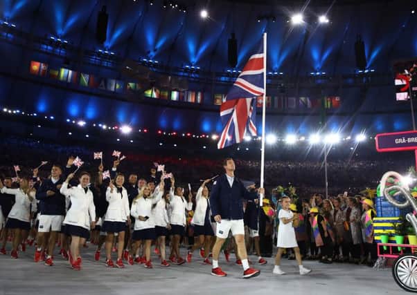 Andy Murray carries the flag during the Opening Ceremony of the Rio 2016 Olympic Games at Maracana Stadium. Picture: Getty Images