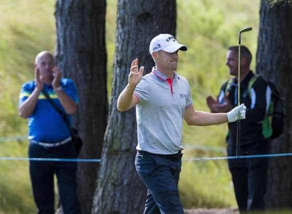 Alex Noren celebrates after chipping in for an eagle at the sixth at Archerfield Links. Picture: PA