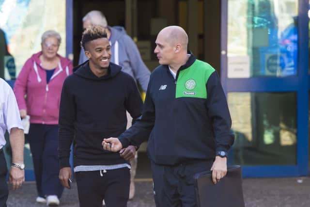 Scott Sinclair with a Celtic official outside Ross Hall hospital in Glasgow.  Picture: Craig Williamson/SNS