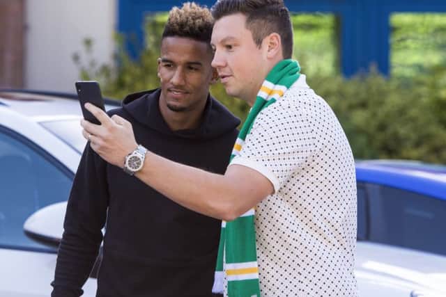 Celtic target Scott Sinclair with a fan after undergoing a medical at Ross Hall. Picture: Craig Williamson/SNS