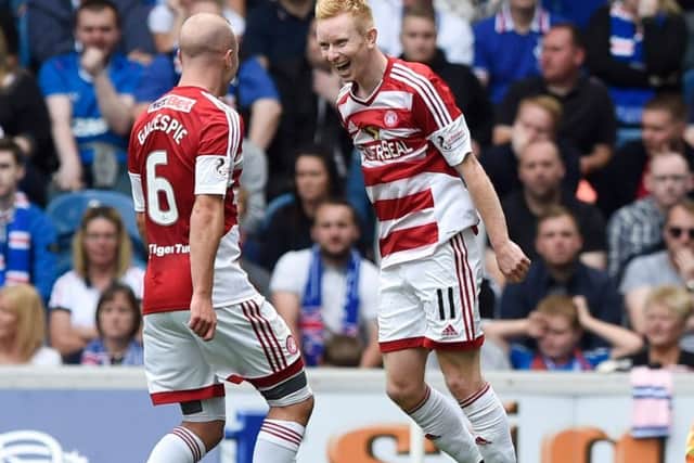 Hamilton's Ali Crawford, right, celebrates with team mate Grant Gillespie after opening the scoring against Rangers. Picture: Ian Rutherford/PA Wire