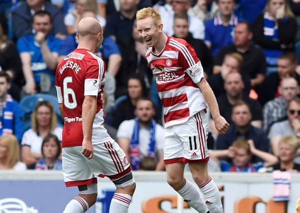 Hamilton's Ali Crawford, right, celebrates with team mate Grant Gillespie after opening the scoring against Rangers. Picture: Ian Rutherford/PA Wire