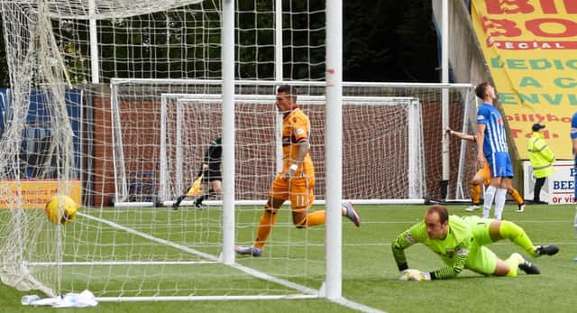 Marvin Johnson puts Motherwell 2-0 in front. Picture: Bill Murray/SNS