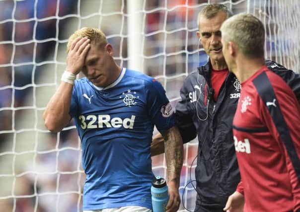 He scored the equaliser, but Rangers striker  Martyn Waghorn limped off with a hamstring injury eight minutes from time. Picture: SNS