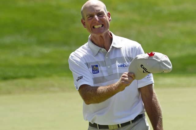 Jim Furyk celebrates after firing a 58 in the final round of the Travelers Championship. Picture: AP