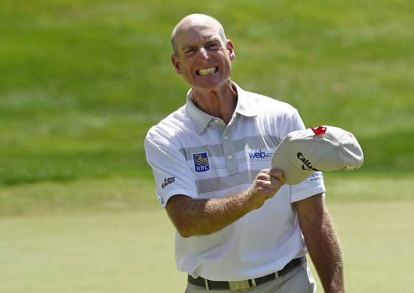 Jim Furyk celebrates after firing a 58 in the final round of the Travelers Championship. Picture: AP