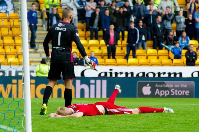 A frustrated Jayden Stockley lies on the ground as Aberdeen were held by St Johnstone. Picture: SNS