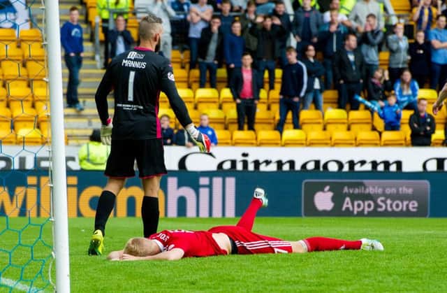 A frustrated Jayden Stockley lies on the ground as Aberdeen were held by St Johnstone. Picture: SNS