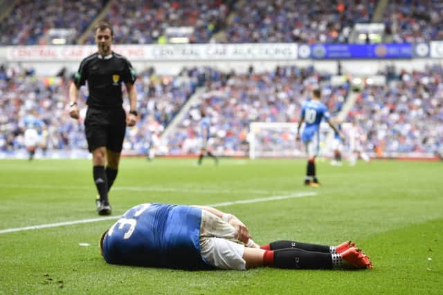 Rangers' Martyn Waghorn pulls up with an injury during Saturday's match with Hamilton. Picture: SNS