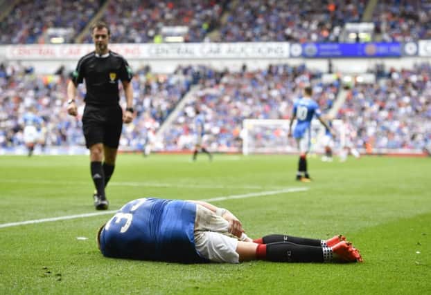 Rangers' Martyn Waghorn pulls up with an injury during Saturday's match with Hamilton. Picture: SNS