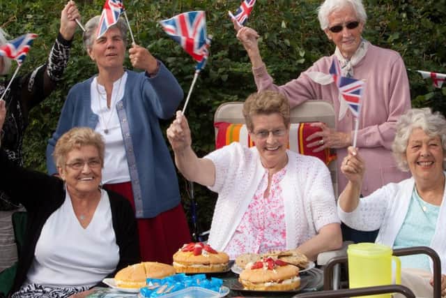 Nan Mavis Williams (centre) was in party mode as she celebrated 100 metre Olympic breastroke victory in Rio for Adam Peaty. Picture: Hemedia