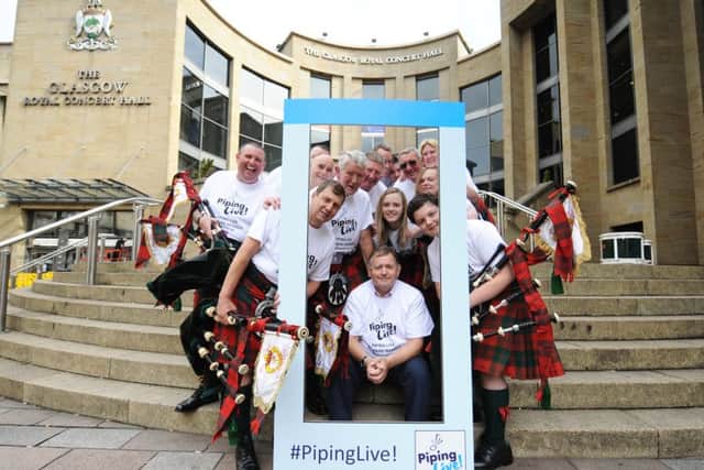 The Alloa Bowmar Pipe Band launch this year's Piping Live!  Picture: John Devlin