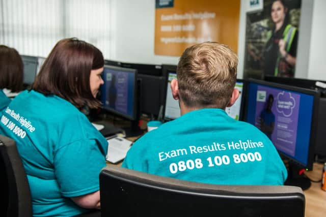 A staff member at the Skills Development Scotland Exam Results Helpline contact centre in Glasgow. Picture: John Devlin/TSPL