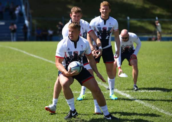 James Davies runs with the ball during a Great Britain Rugby 7's training session at Cruzeiro FC. Picture: Alex Livesey/Getty