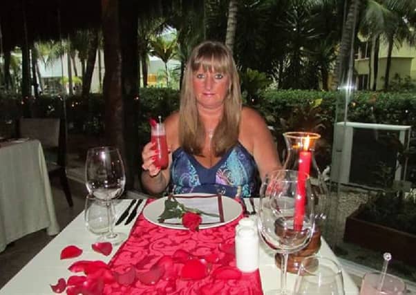Julie Hughes lost a stone after being infected with cyclospora. Picture: PA