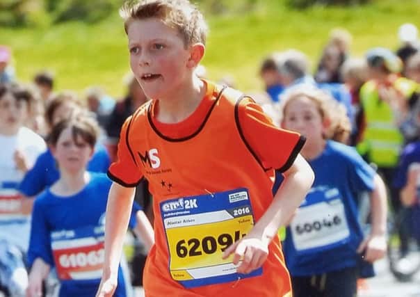 Alistair Aitken, 10, races to raise funds for MS Society Scotland. Picture: Contributed
