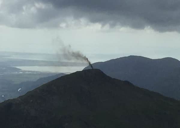Helicopter on fire in Snowdonia. Picture: Huw Price/PA Wire