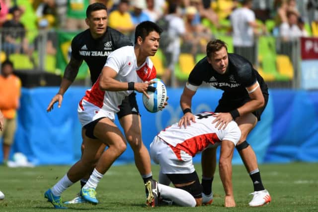 Japan's Yusaku Kuwazuru on the ball during the shock win over New Zealand. Picture: AFP/Getty Images