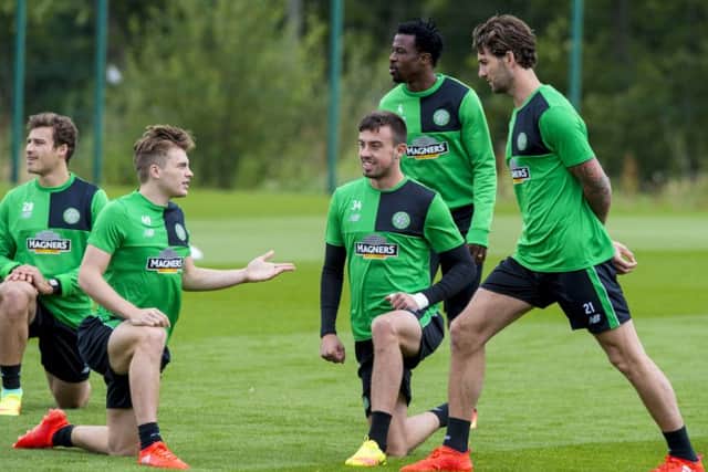Celtic's James Forrest, left, with Eoghan O'Connell and Charlie Mulgrew at training. Picture: SNS