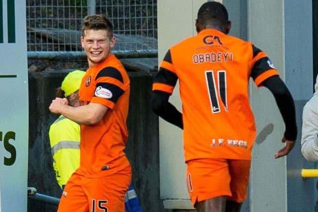 Dundee United's Cammy Smith, left, celebrates making it 2 - 0