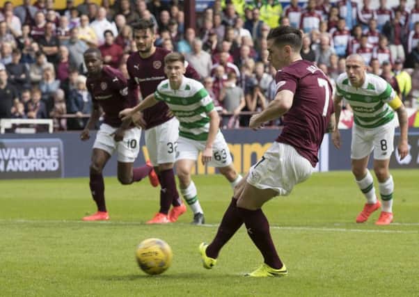 Jamie Walker scores the penalty he won in controversial circustances against Celtic. Picture: Steve Welsh/Getty Images