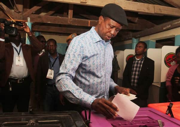 Zambian President Edgar Lungu, of the ruling Patriotic Front, casts his vote. Picture: AFP/Getty Images