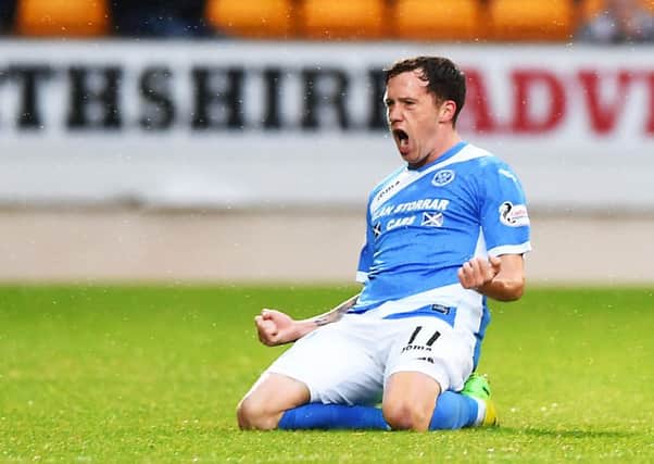 Former Hearts midfielder Danny Swanson celebrates his first of two goals on the night. Picture: SNS