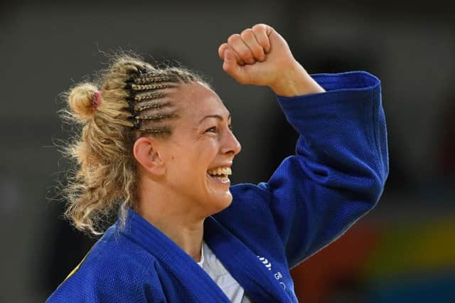 Britain's Sally Conway celebrates after defeating Austria's Bernadette Graf to win bronze in the -70kg judo contest. Picture: AFP/Getty Images