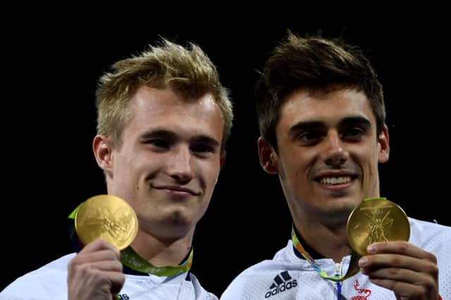 Great Britain's Jack Laugher and Chris Mears with their historic diving golds