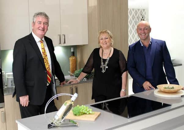 DM Design managing director Donald Macleod, left, with director Ann Macleod and interior designer John Amabile. Picture: Contributed