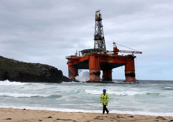The Transocean rig ran aground on Dalmore beach on the Isle of Lewis and is now leaking diesel. Picture: PA