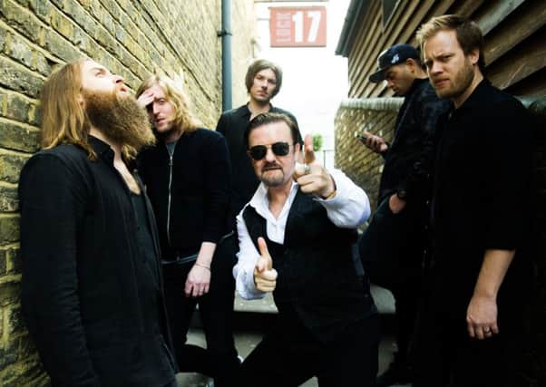 Ricky Gervais (centre) starring in David Brent: Life on the Road. Picture: Contributed